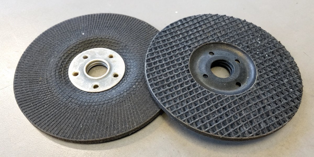 A side-by-side comparison image of a 4.5-inch and a 5-inch grinder, with callouts showing the slight difference in disc diameter.