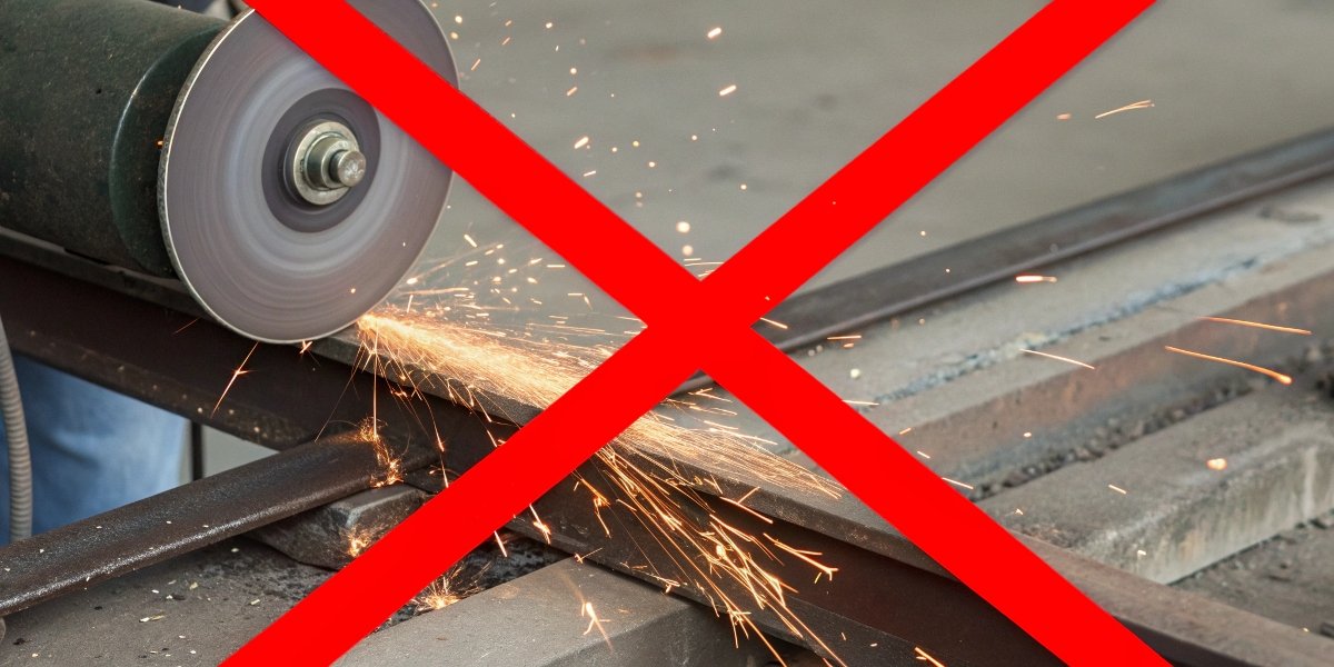 A graphic showing a silicon carbide wheel attempting to grind a steel bar, with a red "X" over the image.