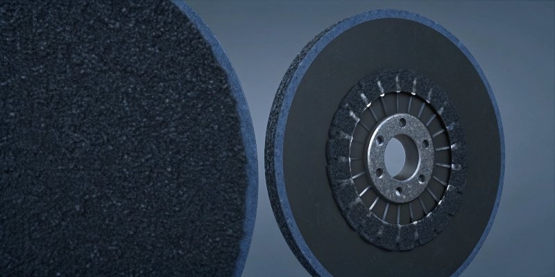 A cutaway view showing the internal fiberglass reinforcement layers in a grinding wheel versus a cutting wheel