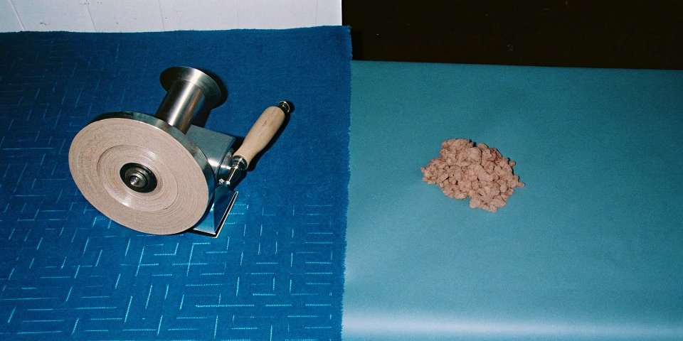 A split image showing a grinding wheel smoothing metal on one side and a meat mincer on the other.
