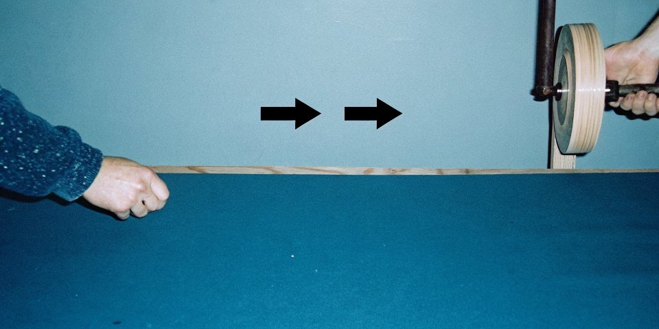 A diagram showing the energy conversion from electrical to mechanical to heat in a grinder.