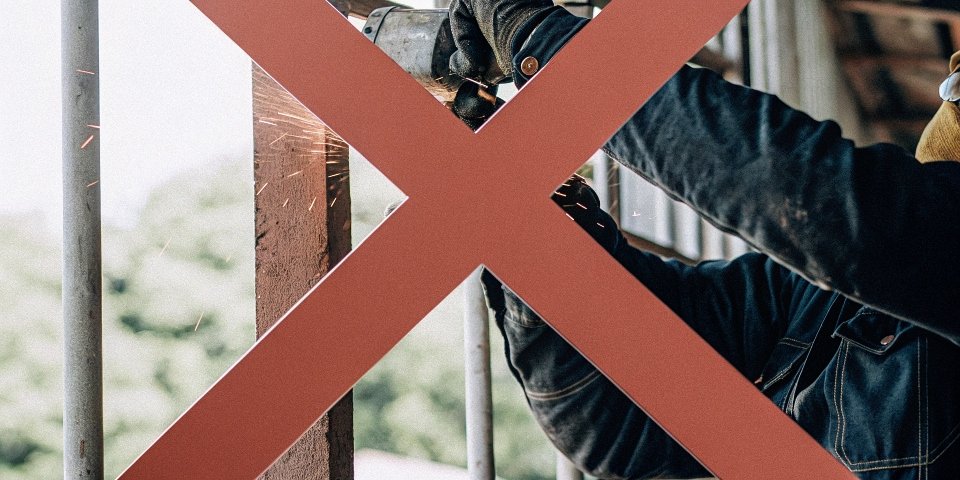 A large red "X" superimposed over an image of someone removing a grinder guard.