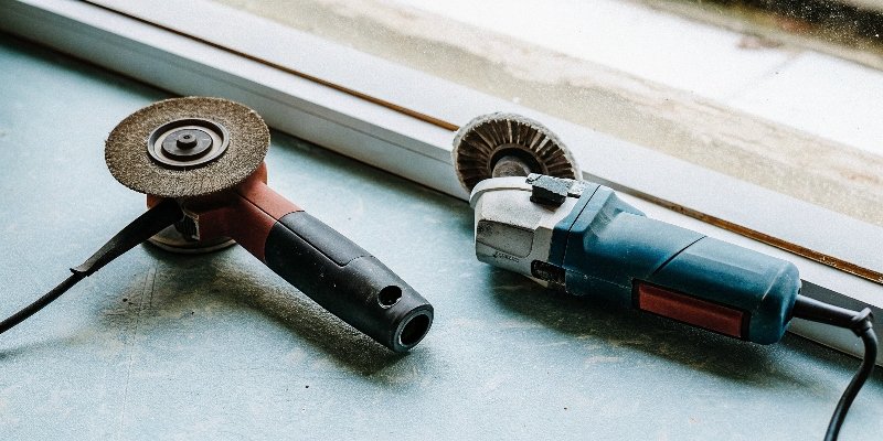 A 4.5-inch angle grinder next to a 3-inch model