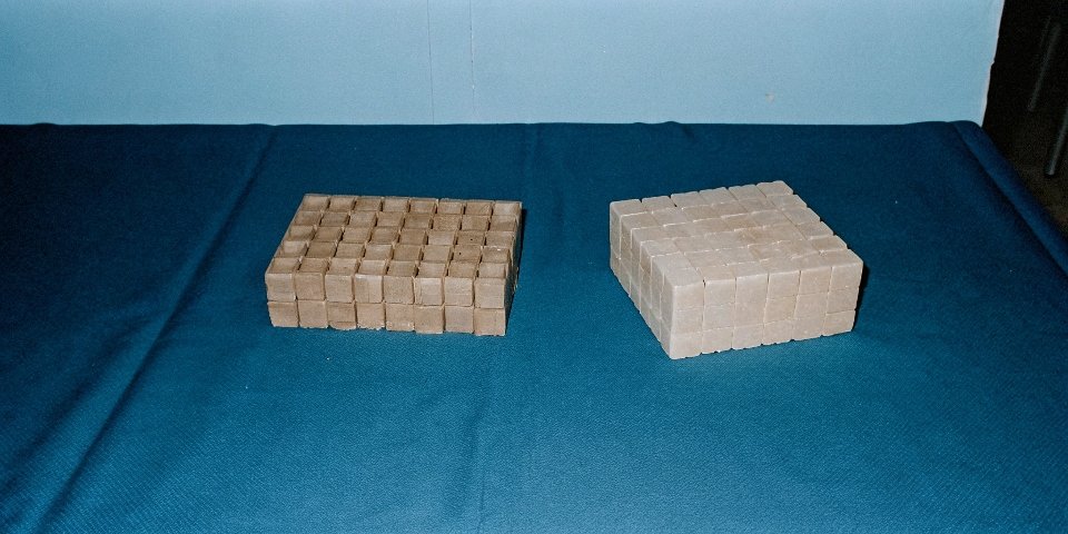 A graphic showing one large block turning into many small cubes (mincing) vs. one block becoming smoother (grinding).