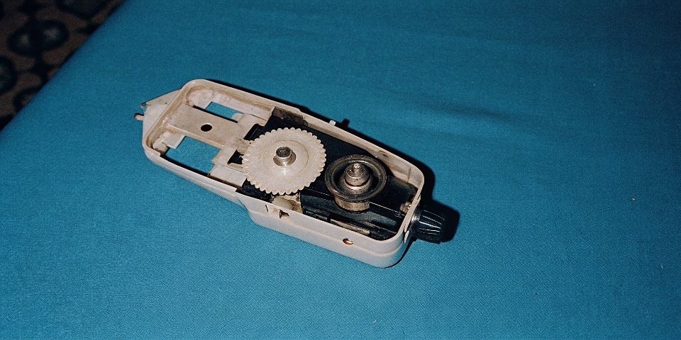 A close-up of a motor's specification plate showing the kW and HP rating.