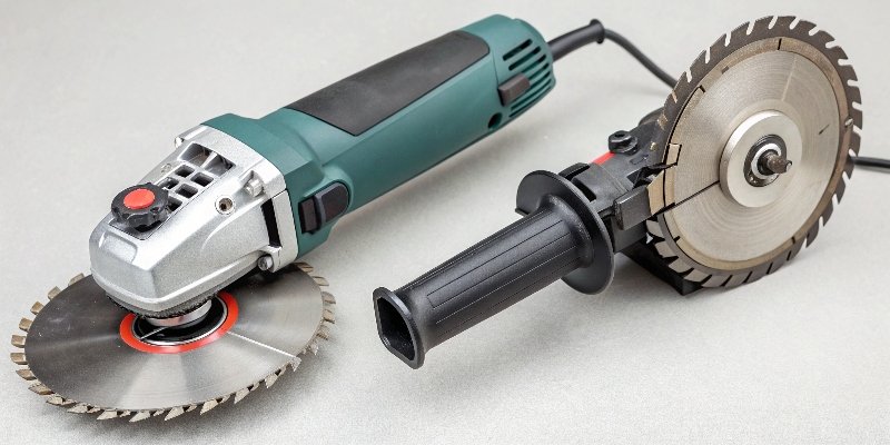 A circular saw and an angle grinder side-by-side to show their different designs