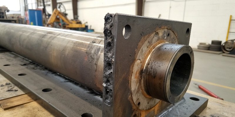 A steel part showing discoloration from heat after being cut improperly